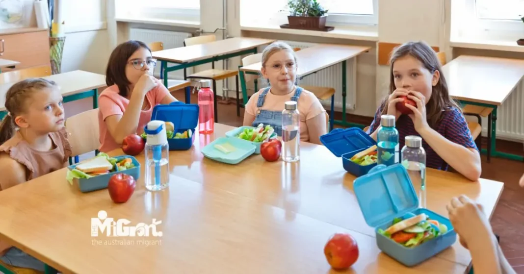 school children eating